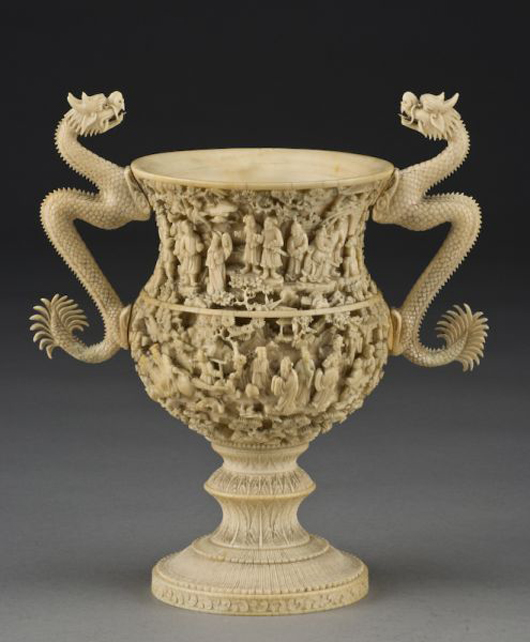 Chinese Qing carved ivory cup, circa late 18th or early 19th century, 8 3/4 inches high, $15,925. Image courtesy Dallas Auction Gallery.